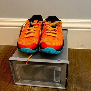 Nike ja 1 

Manderin yellow and blue Size 6.5 

Like new barely used